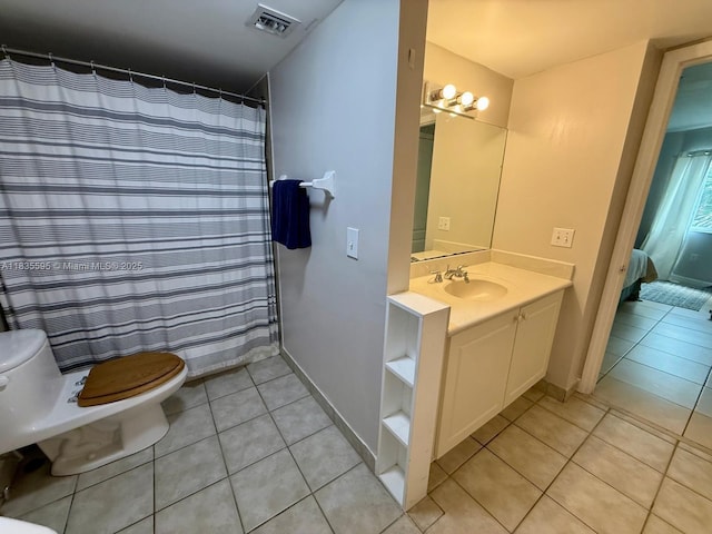 280 SW 20th Rd Unit 404, Miami, FL 33129 - bathroom with tile patterned flooring, vanity, and ensuite bath