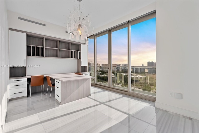 17901 S Collins Ave Unit 1506, Sunny Isles Beach, FL 33160 - office space with built in desk, light tile patterned flooring, a view of city, and a wall of windows