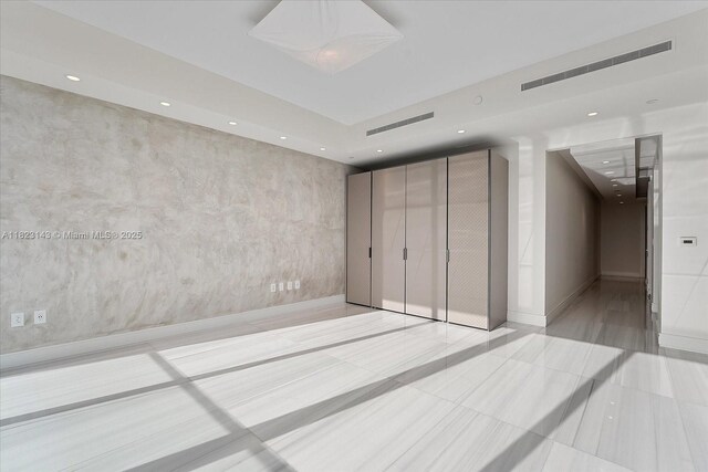 17901 S Collins Ave Unit 1506, Sunny Isles Beach, FL 33160 - unfurnished bedroom featuring recessed lighting and tile patterned flooring