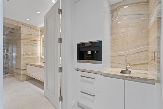 17901 S Collins Ave Unit 1506, Sunny Isles Beach, FL 33160 - bathroom featuring vanity, walk in shower, and recessed lighting