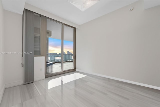 17901 S Collins Ave Unit 1506, Sunny Isles Beach, FL 33160 - spare room with baseboards
