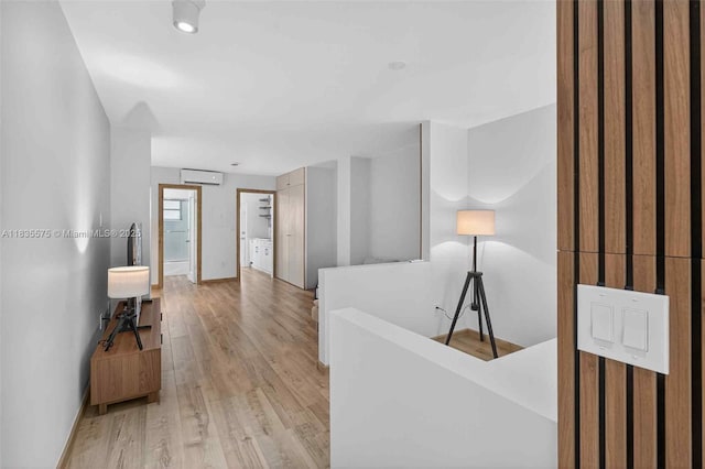 1334 Euclid Ave Unit 4, Miami Beach, FL 33139 - hall with a wall mounted AC and light wood-style floors