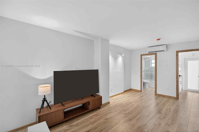 1334 Euclid Ave Unit 4, Miami Beach, FL 33139 - unfurnished living room featuring wood finished floors and a wall unit AC