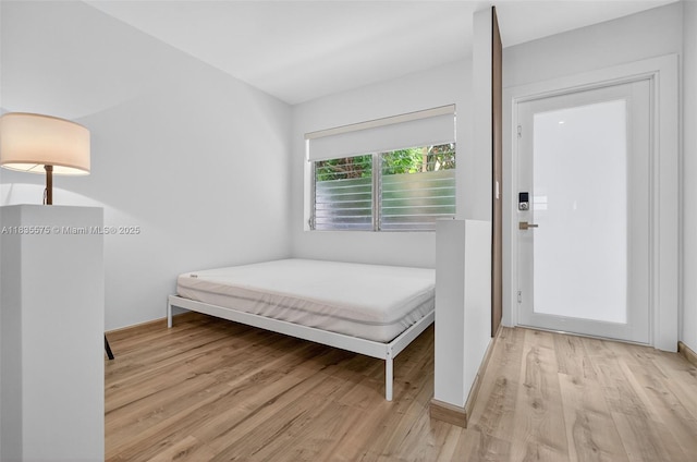1334 Euclid Ave Unit 4, Miami Beach, FL 33139 - bedroom featuring wood finished floors