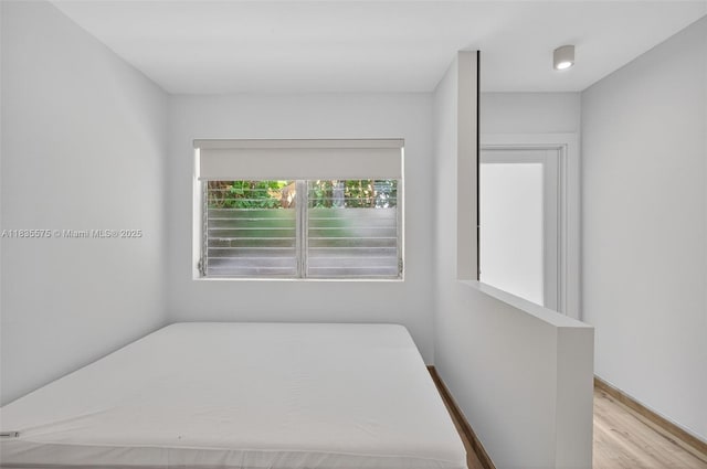 1334 Euclid Ave Unit 4, Miami Beach, FL 33139 - unfurnished bedroom featuring wood finished floors