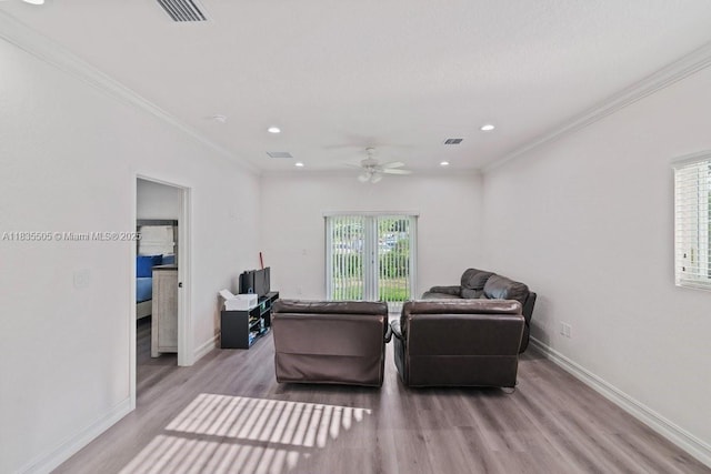 1941 NW 151st St, Miami Gardens, FL 33054 - living room with wood finished floors, recessed lighting, ceiling fan, and crown molding
