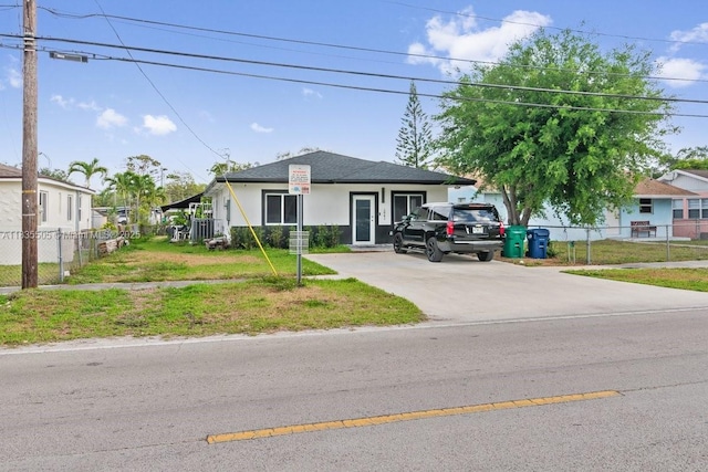 1941 NW 151st St, Miami Gardens, FL 33054 - view of front of house featuring driveway and stucco siding
