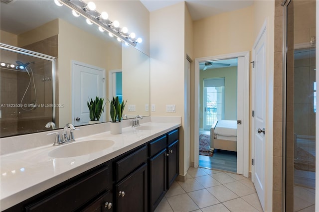 4375 Cascada Cir, Cooper City, FL 33024 - bathroom featuring double vanity, ensuite bath, tile patterned floors, and a tile shower