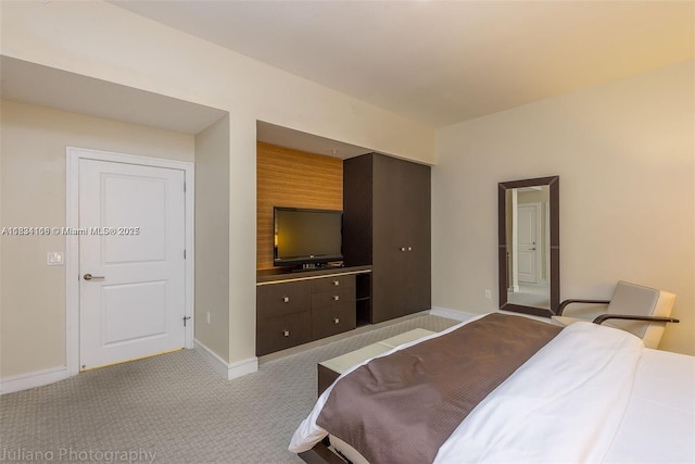 5300 NW 87th Ave Unit 1201, Doral, FL 33178 - bedroom with light carpet and a closet