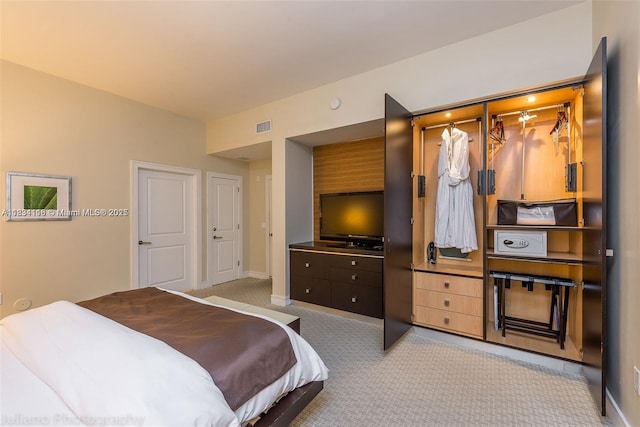 5300 NW 87th Ave Unit 1201, Doral, FL 33178 - bedroom with light carpet and baseboards