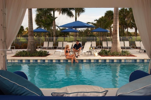 5300 NW 87th Ave Unit 1201, Doral, FL 33178 - community pool with a patio