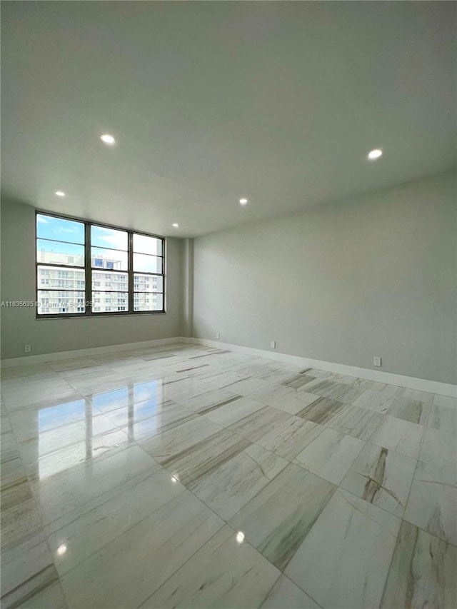 5700 Collins Ave Unit 16B, Miami Beach, FL 33140 - spare room featuring recessed lighting and baseboards