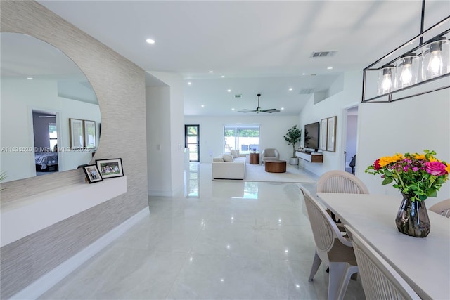 1149 SE Sandia Dr, Port St Lucie, FL 34983 - hallway with arched walkways, recessed lighting, and lofted ceiling