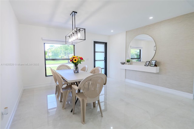 1149 SE Sandia Dr, Port St Lucie, FL 34983 - dining room featuring healthy amount of natural light and recessed lighting