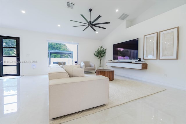 1149 SE Sandia Dr, Port St Lucie, FL 34983 - living area with lofted ceiling, ceiling fan, recessed lighting, and tile patterned floors