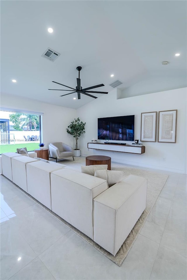 1149 SE Sandia Dr, Port St Lucie, FL 34983 - living room with vaulted ceiling, a ceiling fan, recessed lighting, and light tile patterned floors