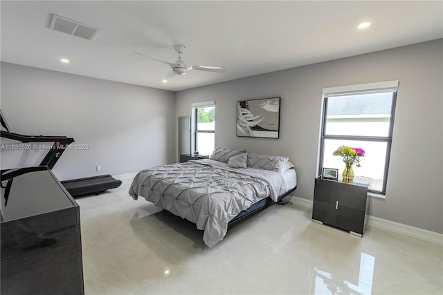 1149 SE Sandia Dr, Port St Lucie, FL 34983 - bedroom with recessed lighting, ceiling fan, and light tile patterned floors