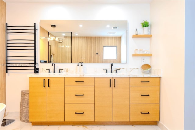 1149 SE Sandia Dr, Port St Lucie, FL 34983 - full bath featuring double vanity, a shower stall, marble finish floors, a soaking tub, and recessed lighting