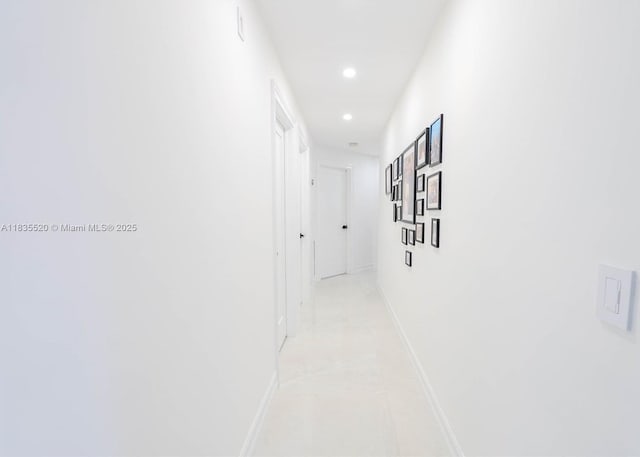 1149 SE Sandia Dr, Port St Lucie, FL 34983 - hall with recessed lighting and light tile patterned floors