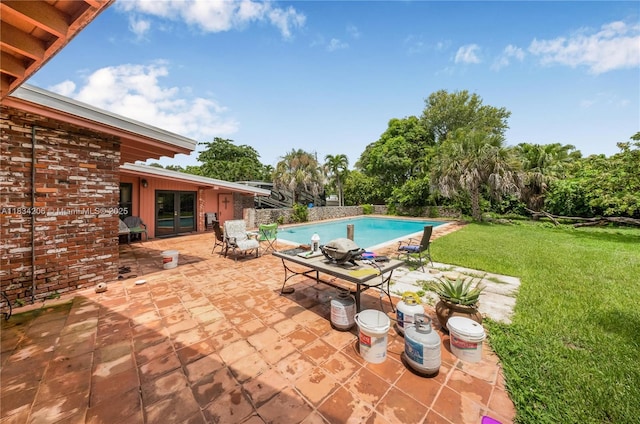 6801 SW 136th St, Pinecrest, FL 33156 - view of patio with french doors and an outdoor pool