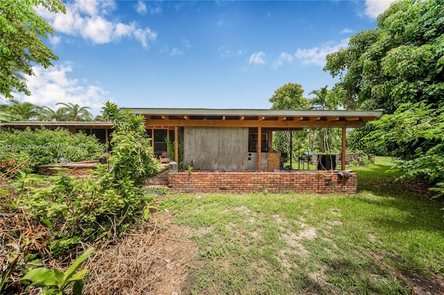 6801 SW 136th St, Pinecrest, FL 33156 - back of house featuring a yard