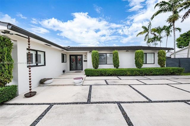 10321 SW 102nd Ave, Miami, FL 33176 - view of front facade featuring french doors and stucco siding