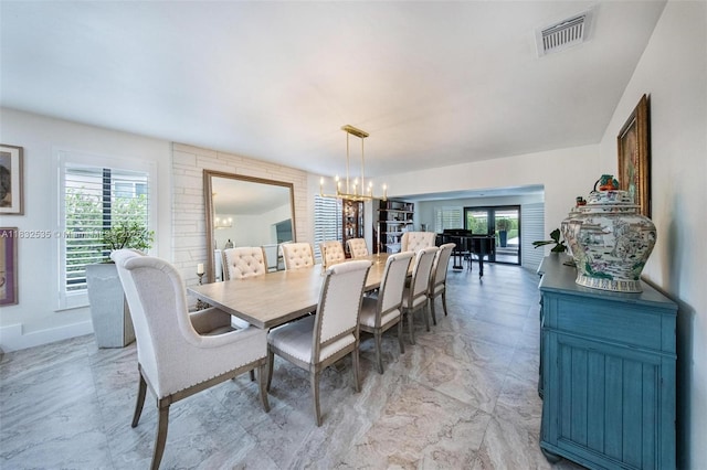 10321 SW 102nd Ave, Miami, FL 33176 - dining space with a chandelier and light marble finish floors