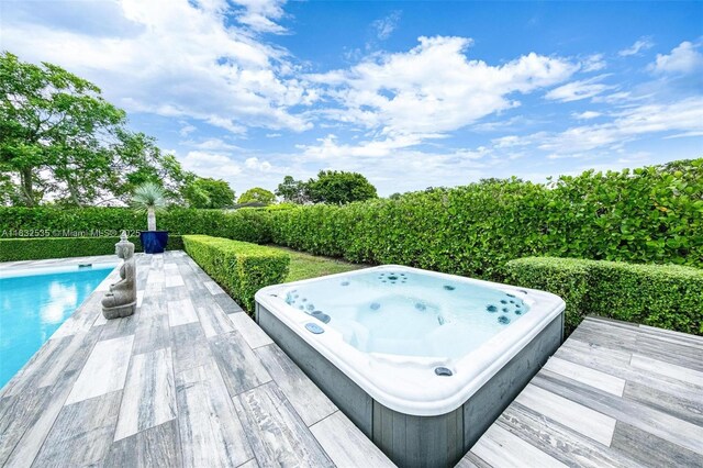 10321 SW 102nd Ave, Miami, FL 33176 - wooden terrace with an outdoor hot tub