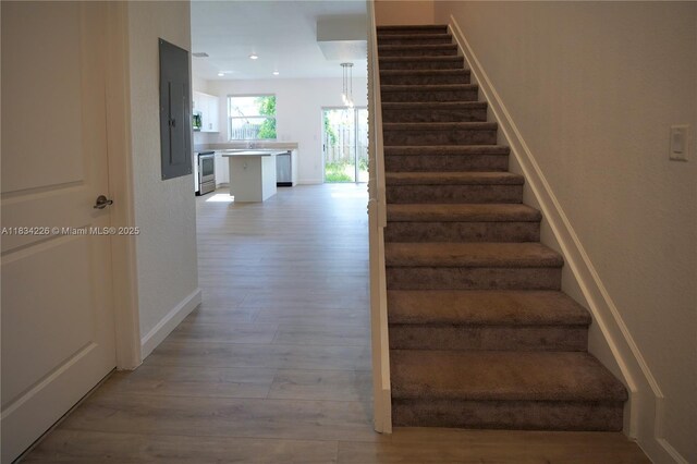 1589 SE 26th Rd, Homestead, FL 33035 - stairs with wood finished floors