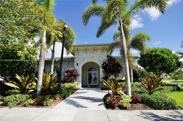 1589 SE 26th Rd, Homestead, FL 33035 - view of front facade with french doors and stone siding