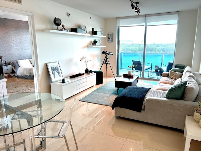 2641 N Flamingo Rd Unit 605N, Sunrise, FL 33323 - living area featuring floor to ceiling windows and track lighting