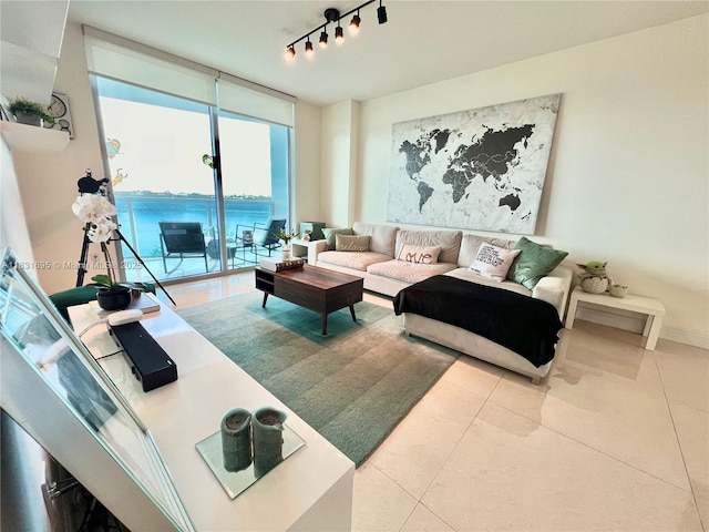 2641 N Flamingo Rd Unit 605N, Sunrise, FL 33323 - tiled living area featuring rail lighting