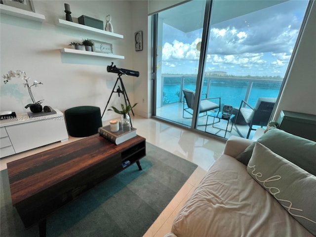 2641 N Flamingo Rd Unit 605N, Sunrise, FL 33323 - tiled living area featuring a water view