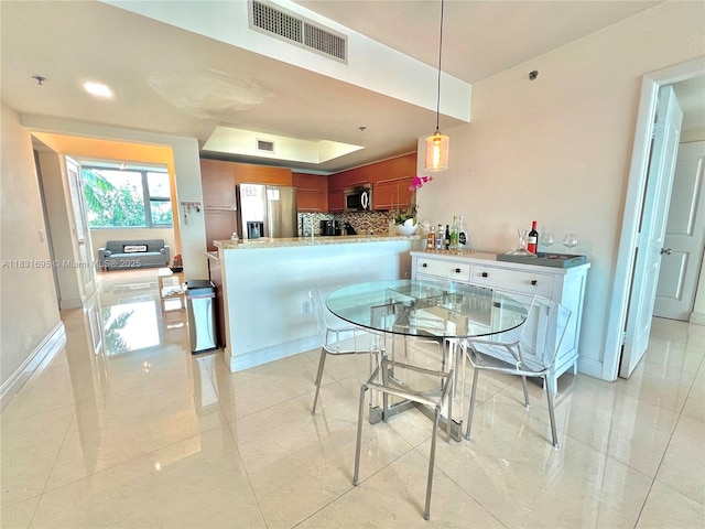 2641 N Flamingo Rd Unit 605N, Sunrise, FL 33323 - dining room with light tile patterned flooring