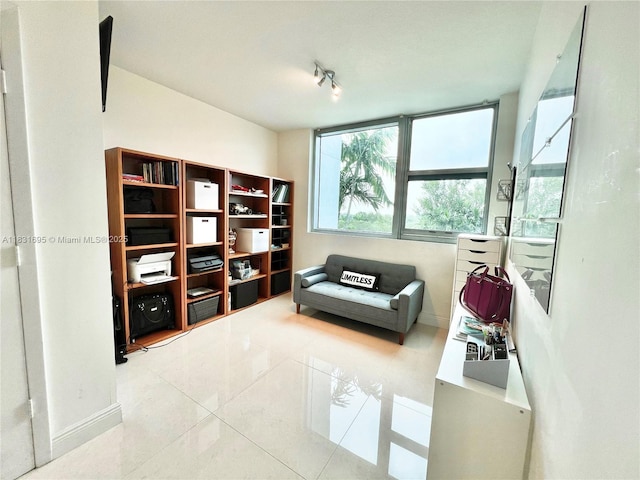 2641 N Flamingo Rd Unit 605N, Sunrise, FL 33323 - living area featuring tile patterned floors and baseboards
