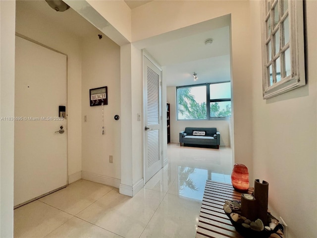 2641 N Flamingo Rd Unit 605N, Sunrise, FL 33323 - corridor featuring tile patterned floors and baseboards