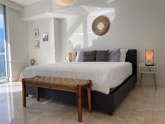 485 Brickell Ave Unit 3606, Miami, FL 33131 - bedroom featuring light marble finish flooring