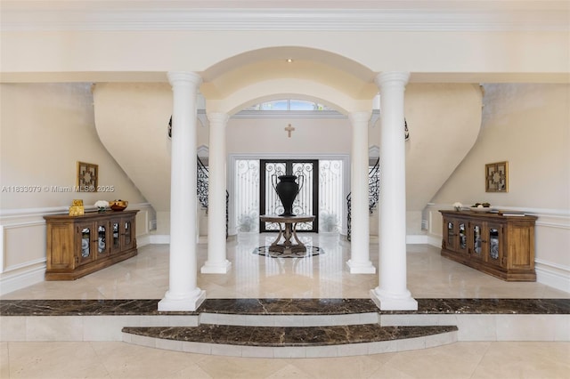 7245 SW 104th St, Pinecrest, FL 33156 - entrance foyer featuring marble tiled floors and decorative columns