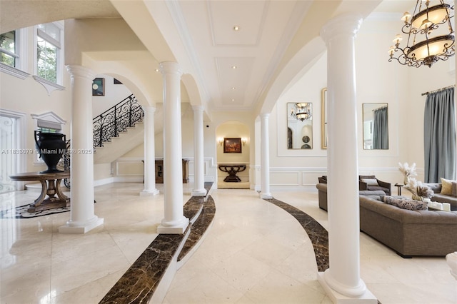 7245 SW 104th St, Pinecrest, FL 33156 - foyer with a decorative wall, a towering ceiling, ornamental molding, stairs, and recessed lighting