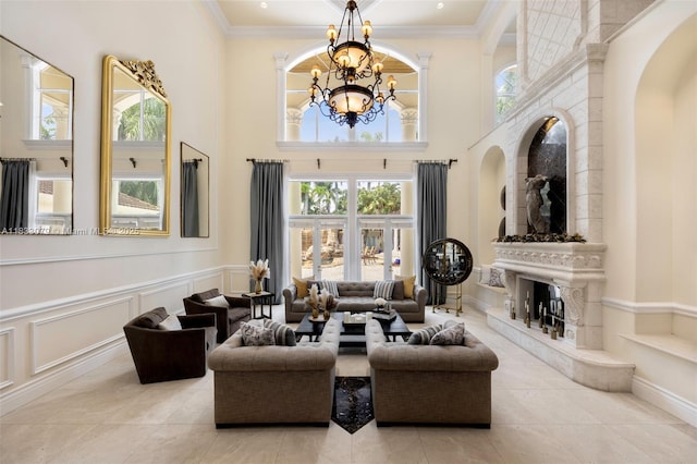 7245 SW 104th St, Pinecrest, FL 33156 - living room featuring a chandelier, tile patterned flooring, a towering ceiling, arched walkways, and plenty of natural light