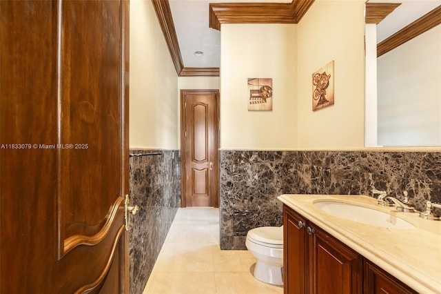 7245 SW 104th St, Pinecrest, FL 33156 - bathroom featuring crown molding, tile walls, vanity, tile patterned flooring, and a wainscoted wall