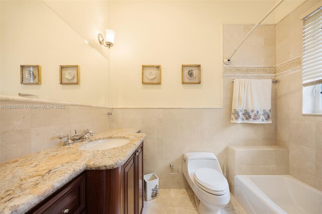 7245 SW 104th St, Pinecrest, FL 33156 - bathroom featuring tile walls, vanity, tile patterned flooring, and wainscoting