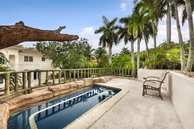 7245 SW 104th St, Pinecrest, FL 33156 - view of swimming pool featuring a patio
