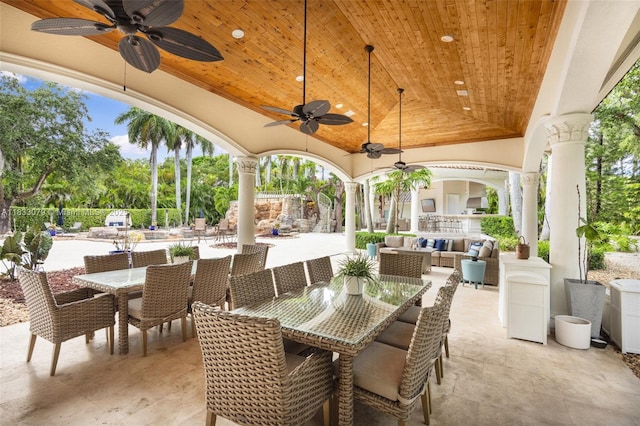 7245 SW 104th St, Pinecrest, FL 33156 - view of patio / terrace featuring outdoor dining space, exterior kitchen, a ceiling fan, and outdoor lounge area