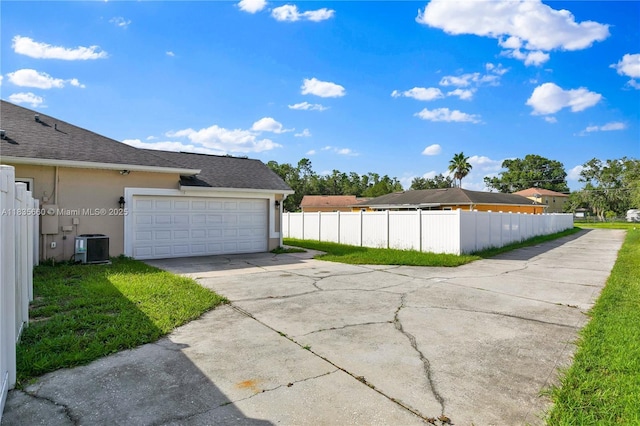 334 Colony St, Kissimmee, FL 34758 - garage with concrete driveway