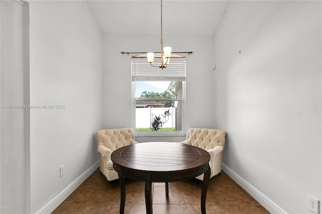 334 Colony St, Kissimmee, FL 34758 - tiled dining space with a chandelier and baseboards