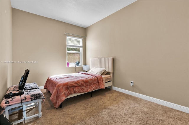 334 Colony St, Kissimmee, FL 34758 - carpeted bedroom featuring baseboards