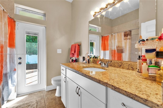 334 Colony St, Kissimmee, FL 34758 - bathroom with vanity, tile patterned flooring, and curtained shower