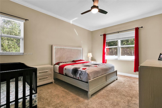 334 Colony St, Kissimmee, FL 34758 - carpeted bedroom featuring crown molding and a ceiling fan