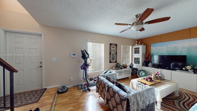 15 Laredo Pl Unit 2-7, Davie, FL 33324 - living area with a ceiling fan, wood finished floors, and a textured ceiling